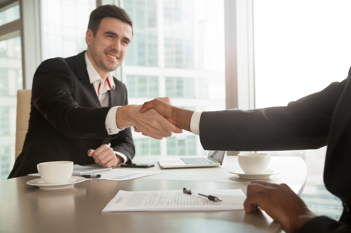 partners-shaking-hands-after-singing-contract